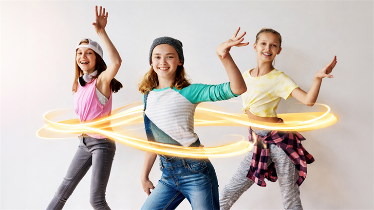Young people rehearsing a hip hop dance routine
